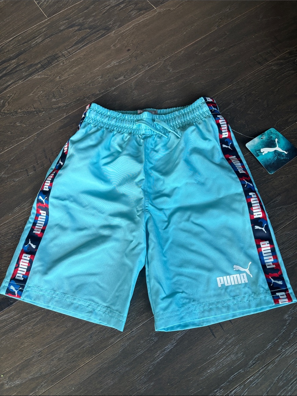 Puma Elastic waist, drawcord,mesh panty lined,Puma logo,back pocket swim trunks